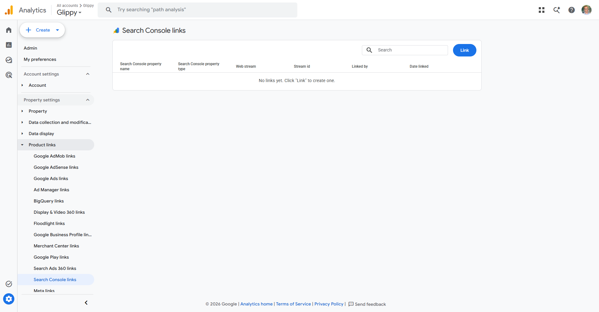 The Google Analytics 4 admin screen linking a Search Console property, with the required roles and the reports that get unlocked