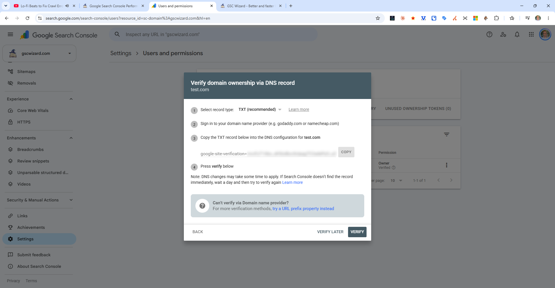 The Verify domain ownership via DNS record dialog in Google Search Console, with the steps to copy a TXT record into the DNS settings of the domain (token blurred)